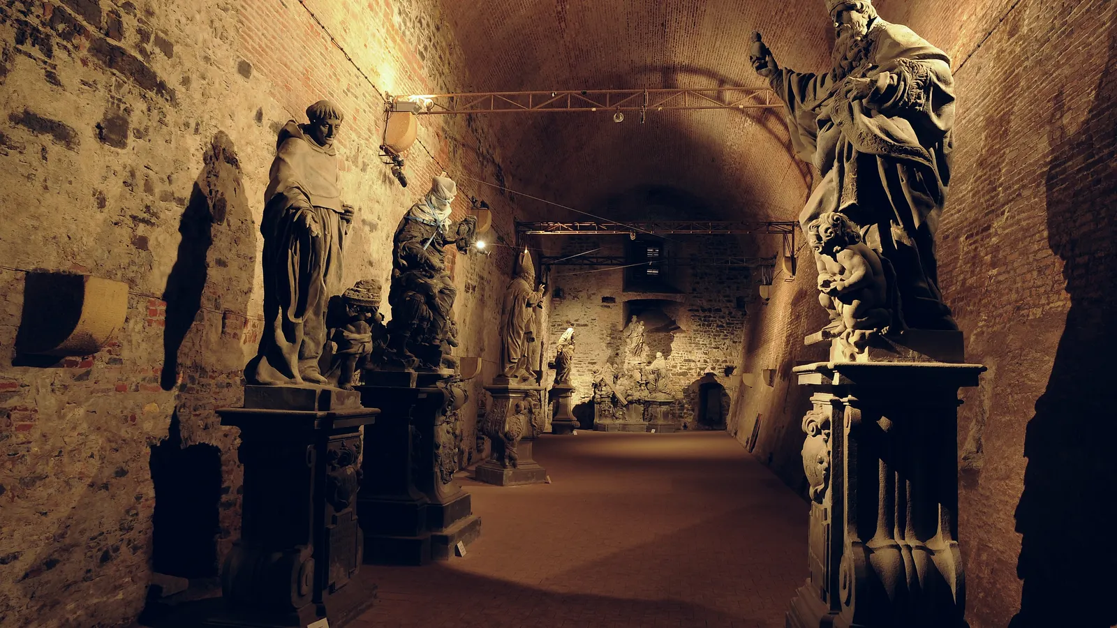 The Gorlice hall in the casemates of Vyšehrad with the original statues from Charles Bridge