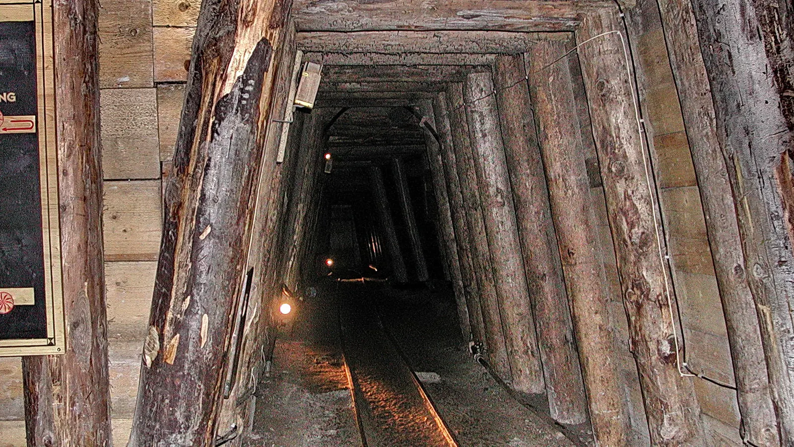 A timbered gallery with rails in the salt mine on the Dürrnberg near Hallein