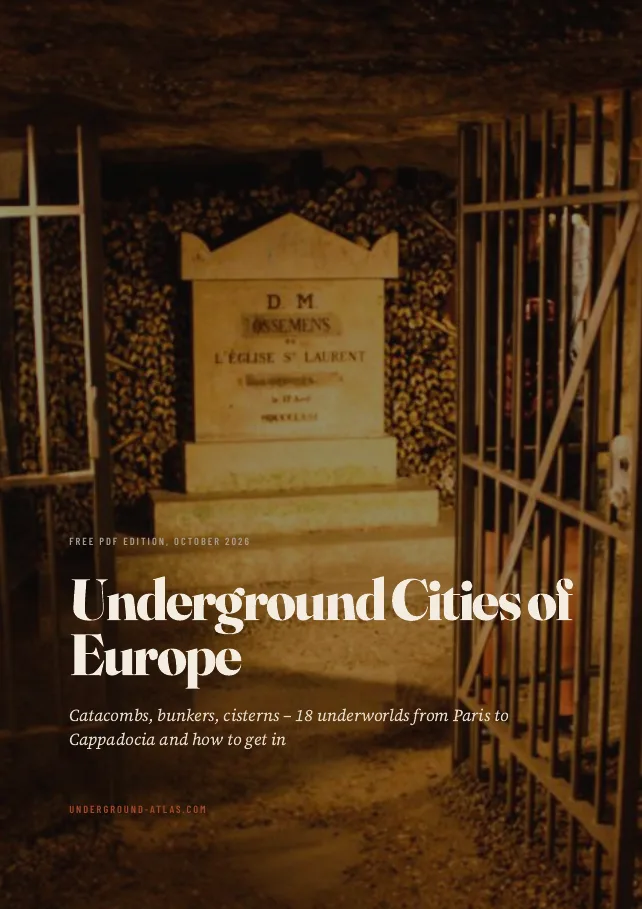 Cover of the free PDF travel guide Underground Cities of Europe showing the ossuary of the Paris Catacombs